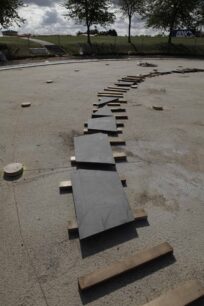 Laying out black tiles