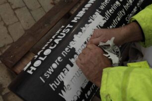 Reveal of lettering on pillars