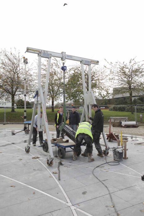Moving first pillars into position